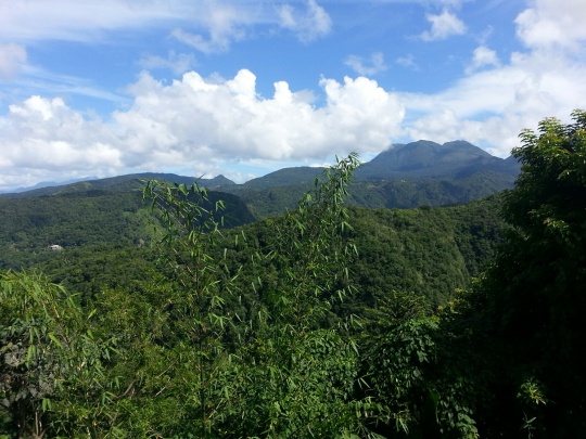 View from our apartment at hills and volcanic mountains of Dominica.