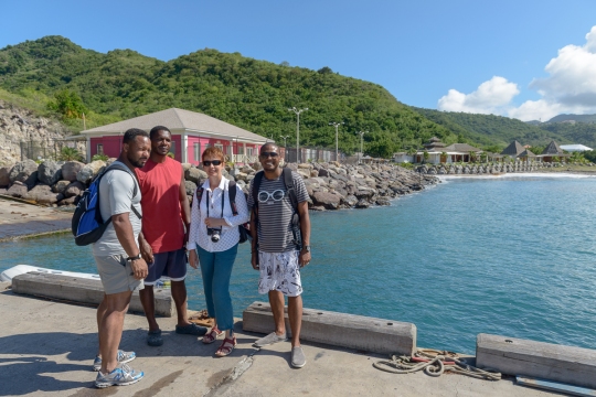 Margaret with our boatman after boat tour, along with Patrick and Mark from our creative team.
